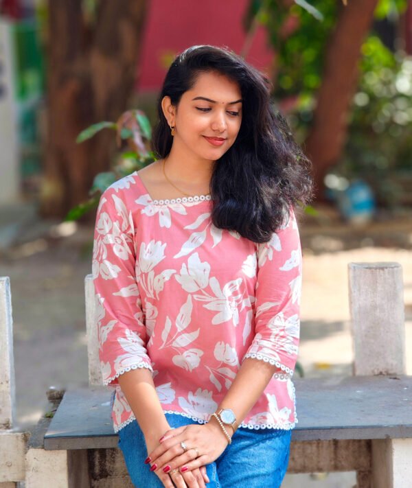 IMG_20260428_083453600 (1) Pink Top with Striking White Flower Prints